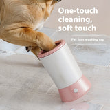 Pet foot washing cup with a dog using it on a tiled floor.