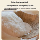 Cozy rattan nests on a wooden cat tree for playful and relaxed cats