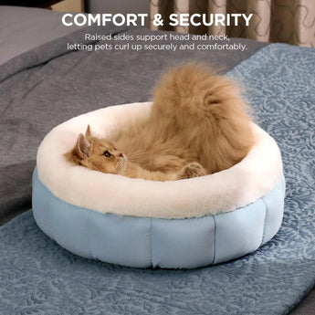 Fluffy donut cat bed for secure and comfortable indoor lounging.