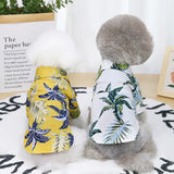 Colorful Hawaiian summer dog clothes made of lightweight fabric for tropical adventures and sunny weather walks.