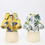 Soft Hawaiian dog shirt with coconut tree prints designed for summer fun and breathable pet comfort.