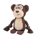 Monkey plush dog toy featuring a built-in squeaker for interactive play.