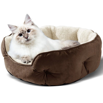 Breathable plush round bed for pets with non-slip base and enclosed design for added safety