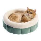 Cozy round donut dog bed for puppies and kittens, perfect for indoor comfort.