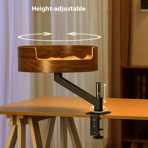 Wooden lamp with height-adjustable arm on a table against a neutral background