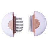 White hair removal device with comb and clip on a white background