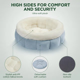 Secure and cozy round cat bed with raised edges for added comfort.