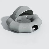 Foldable circular bed and play tunnel for cats.